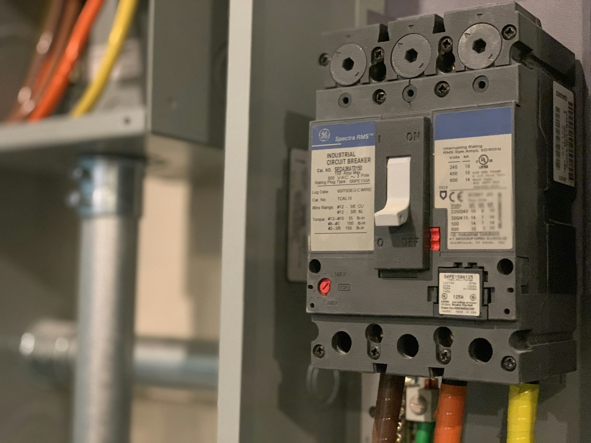 A residential switchboard with circuit breakers and cable lugs installed by Ironbark Electrical